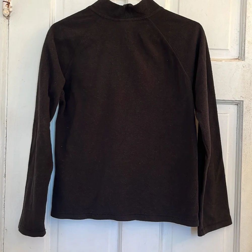 The North Face girls black fleece jacket in size medium 10-12
